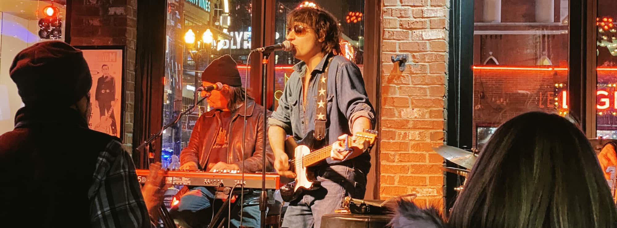 bar singer on guitar in Sarasota